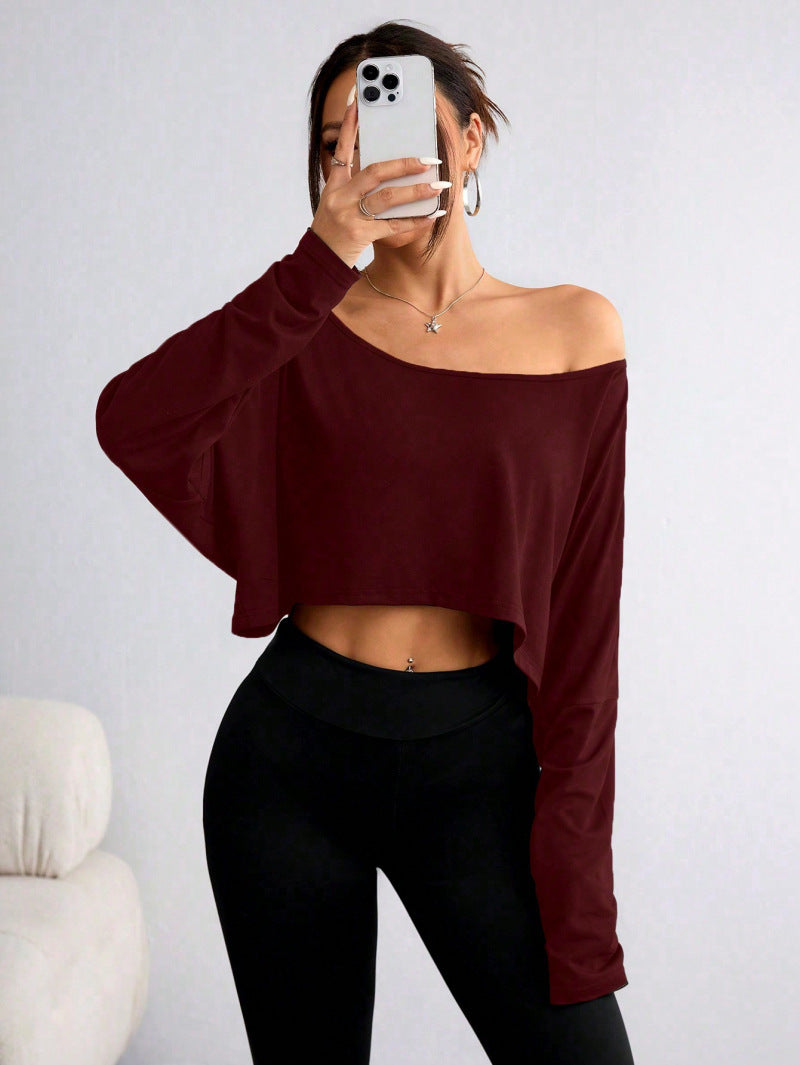 A loose one-shoulder blouse