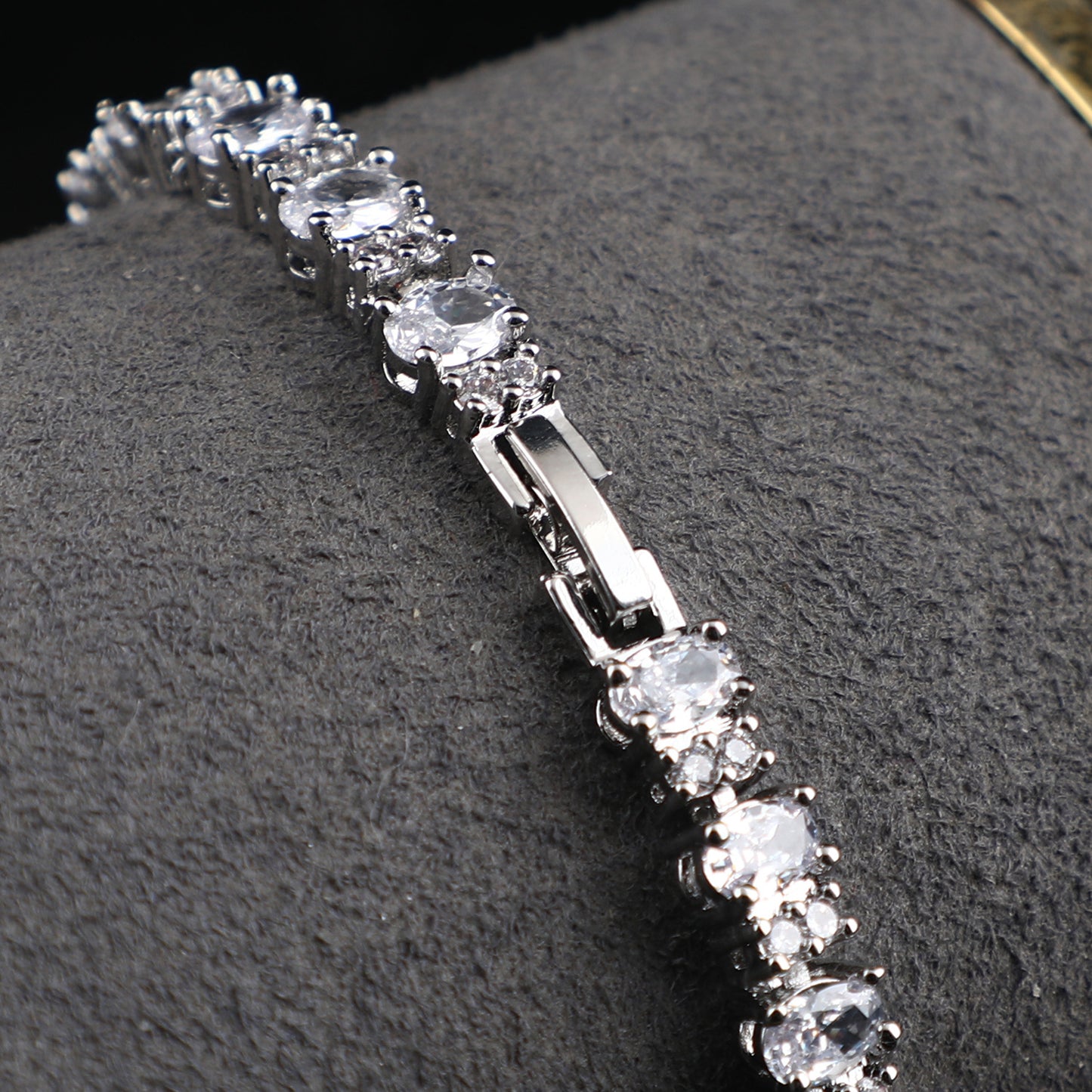 The bracelet is Adorned with a Copper-Plated genuine White Gold Claw chain that is slightly inlaid throughout