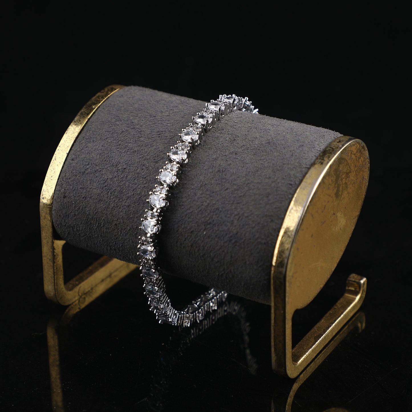 The bracelet is Adorned with a Copper-Plated genuine White Gold Claw chain that is slightly inlaid throughout