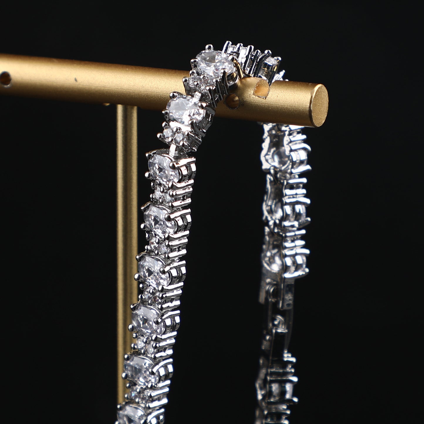 The bracelet is Adorned with a Copper-Plated genuine White Gold Claw chain that is slightly inlaid throughout