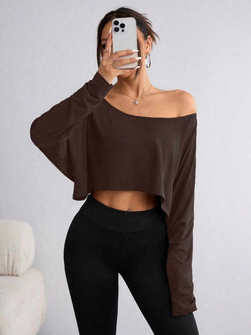 A loose one-shoulder blouse