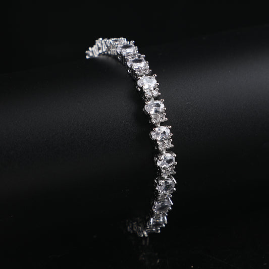 The bracelet is Adorned with a Copper-Plated genuine White Gold Claw chain that is slightly inlaid throughout